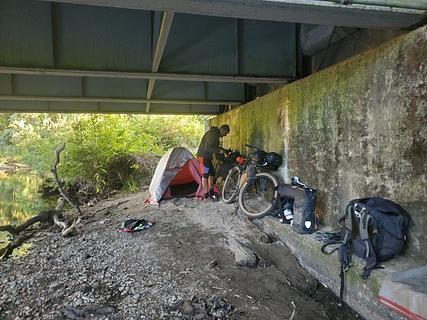 Cyclist Bridge Camping